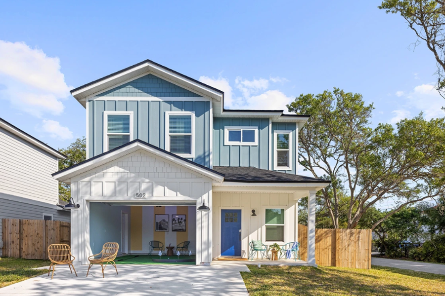 Luxury home in St. Augustine - Vilano Fairway with private putting lounge, modern exterior, and nearby golf courses.